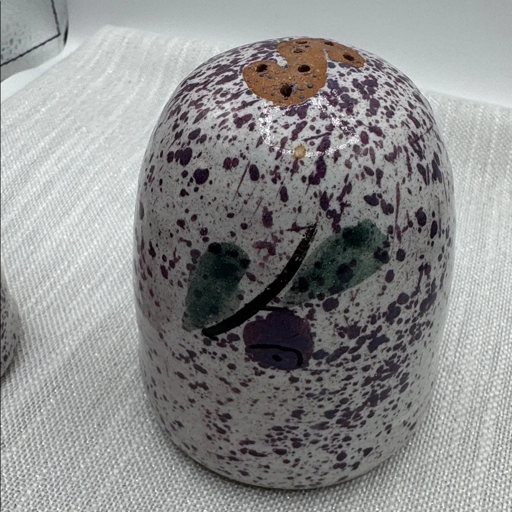 Salt and pepper shaker clay pottery poss. Mexico, purple floral speckled design